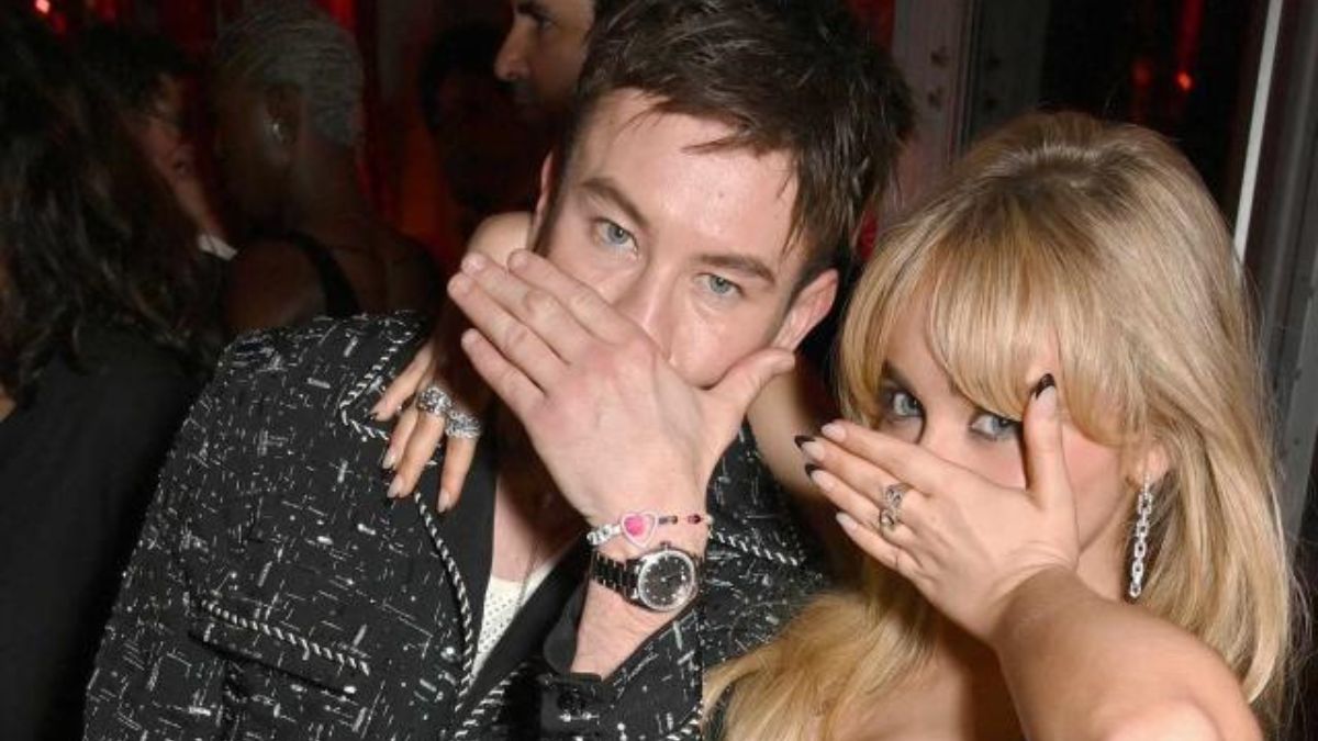 Sabrina Carpenter and Barry Keoghan pose together at Vanity Fair Oscars party amid rumored romance