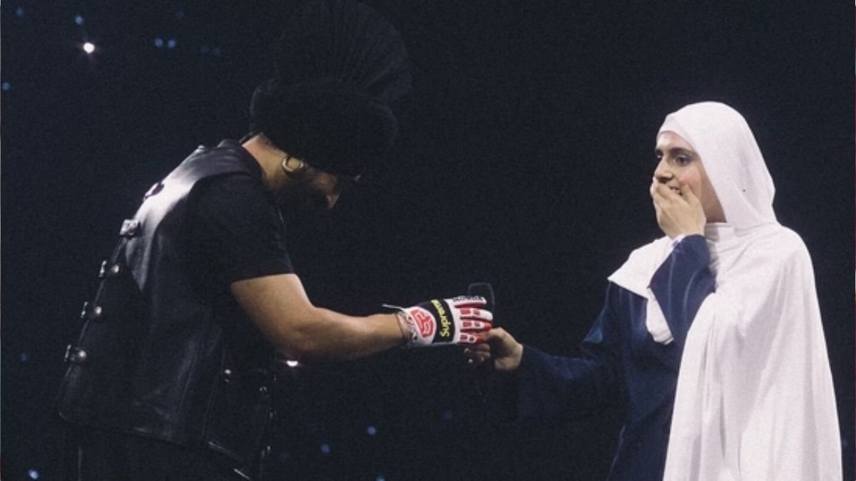 Diljit Dosanjh presents a gift to a Pakistani fan during his concert; introduces family for the first time
