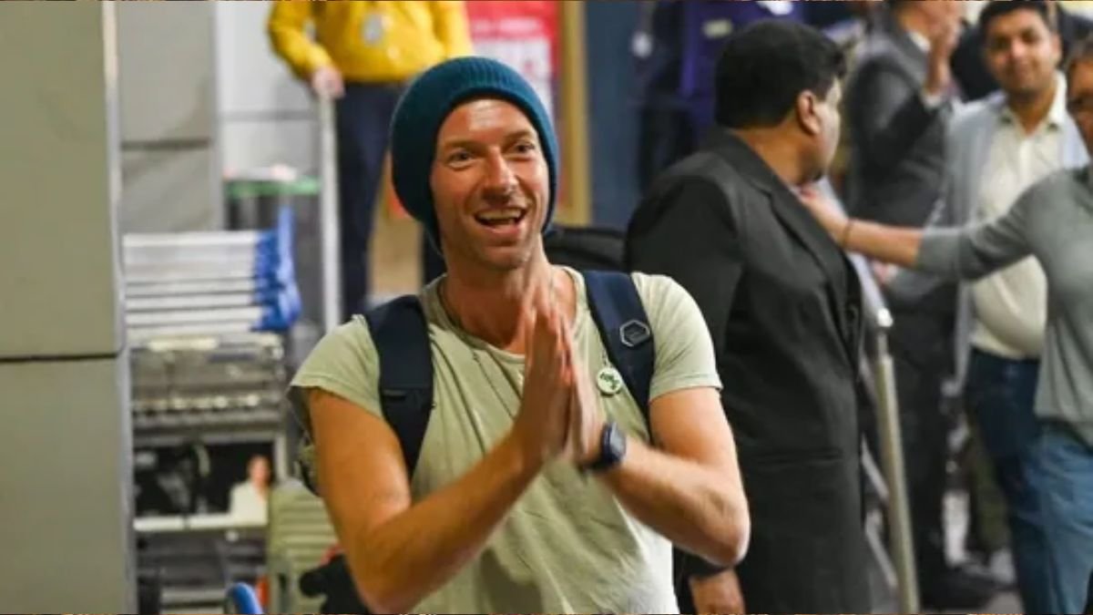 Coldplay member Chris Martin arrives at Mumbai airport with partner Dakota Johnson